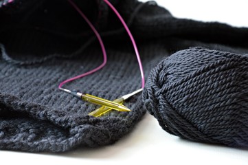 winter hobby, a black wool homemade pullover work in progress, almost finished