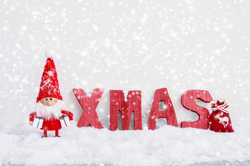 Christmas greeting card. Santa gnome background with Christmas decoration and snow.