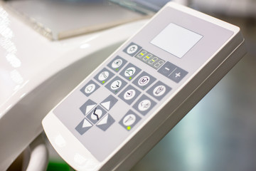 Modern control panel of dentist machine for treatment teeth. Dentist workplace in clinic.