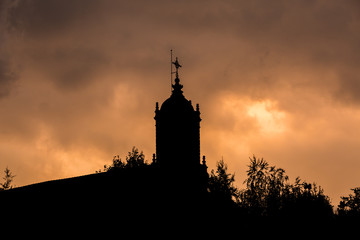 colorful sunset over a church
