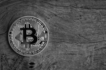 coin bitcoin on a wooden background