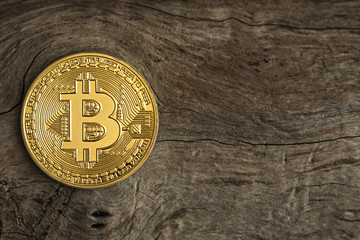 bitcoin on a wooden background