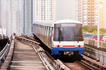 Electric skytrain is running in downtown of Bangkok metropolitan region.