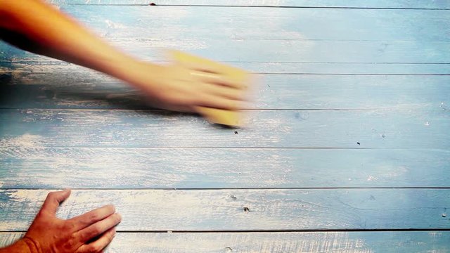 A footage of a man polishing the surface