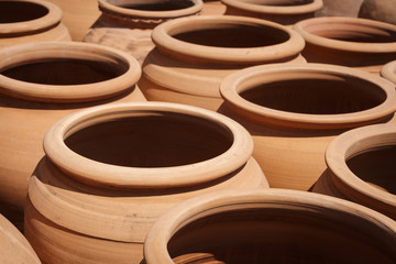  many clay pots, empty clay pot collection