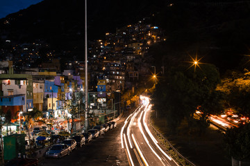 Fototapeta na wymiar long exposure shot of the traffic through the tunnels below the Rocinha favela in Rio de Janeiro