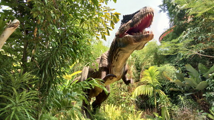 Naklejki  Tyrannosaurus Rex w dżungli