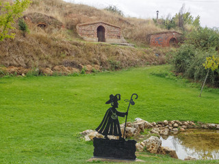 Peregrino at the fountain in front of cellars - La Virgen del Camino, Castile and Leon, Spain