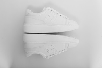  flat top photographed female flat sport sneaker shoes on a white background