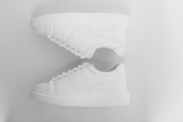  flat top photographed female flat sport sneaker shoes on a white background