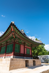 The Korea traditional architecture have a beauty of both colorful and curve under blue and high sky in autumn. Here is Gyeongbokgung Palace where is one of the famous places to tourist who visit Korea
