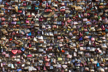 Love padlocks on the fence of the Hohenzollern Bridge in Cologne