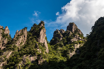 stunning rock formation at the peaks of Mount SanQiang on a sunny day