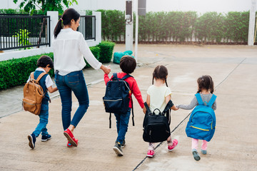 Family children kid son girl and boy kindergarten walking going to school