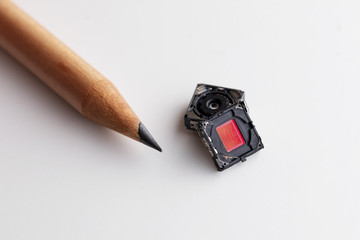 Small Digital camera lens and CCD compare with pencil