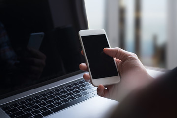 Man using smart phone