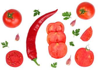 Pepper, tomatoes, garlic and parsley leaves isolated on white