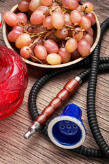 Stylish oriental shisha with grapes