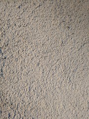 A rough plastered surface, outer building covering