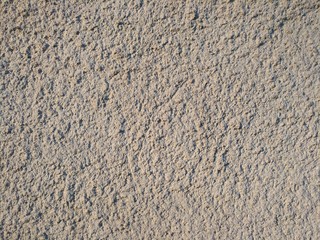 A rough plastered surface, outer building covering