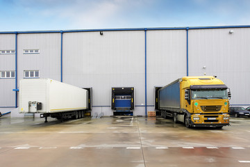 Loading docks in warehouse with truck