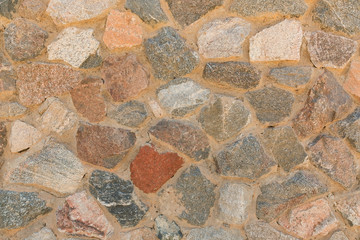 A wall of colored stones