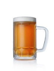 Single glass mug of cold light beer with foam