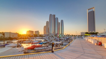 Al Bateen marina Abu Dhabi timelapse with modern skyscrapers on background