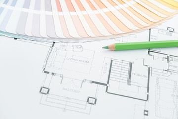 colors and material samples on architectural drawings of the modern house