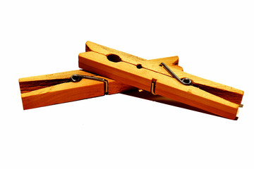 view of two wooden clothes pegs hanging