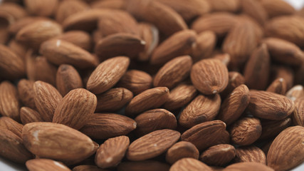 closeup roasted almonds background