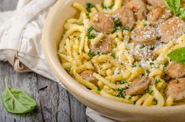 Homemade spaetzle, barbecue sausage and fresh cheese