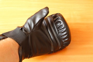 Boxing glove on hand