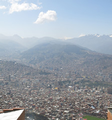 The city of La Paz high in the Andes Mountains in Bolivia .