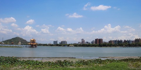 Kaohsiung cityscape with lake and temple