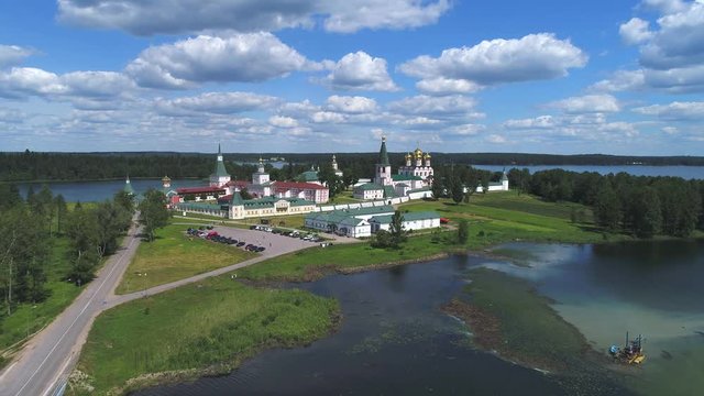 View of the Valdaisky Iversky Virgin Svyatoozersky monastery. Sunny June day (aerial). Novgorod region, Russia