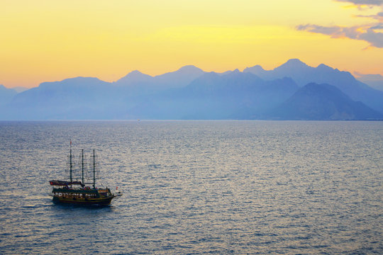 Touristic Pirate ship in the bay of Antalya at sunset, Turkey