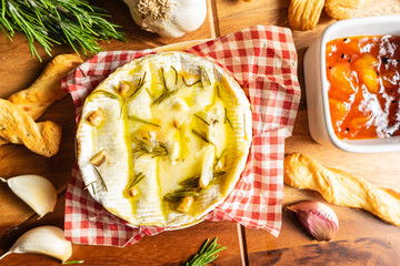 Oven Baked Camembert with Garlic,Rosemary and Chutney