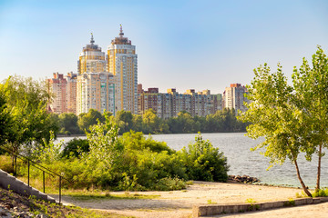 Fototapeta na wymiar High Obolon buildings near the Dnieper river in Kiev, Ukraine.
