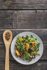 Salad baked eggplant and fresh tomatoes and arugula