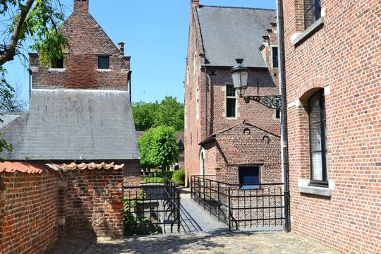 Small bridge and historical houses in the Grand Beguinage of Leuven, Belgium