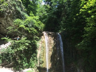 Beautiful view of the waterfall in the forest.