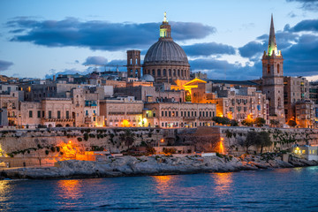 beautiful evening scene of Basilica Our Lady Mount Carmel in Valletta from Sliema, Malta, close up - obrazy, fototapety, plakaty