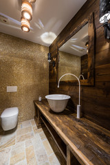 Vintege washbasin and lavatory in luxury bathroom