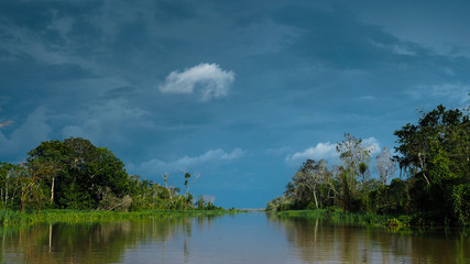 A storm is coming. View from a boat in the amazonas river in peru