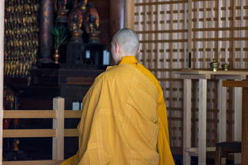 Shingon Buddhist monk praying in temple at Koyasan, Wakayama prefecture of Japan
