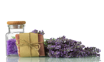 Spa kit. Salt, handmade Soaps and fresh branches of lavender isolated on white