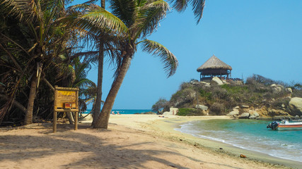 tropical beach with turquoise water at tayrona natural park