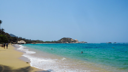 tropical beach with turquoise water at tayrona natural park