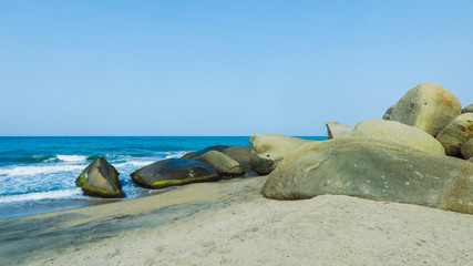 tropical beach with turquoise water at tayrona natural park